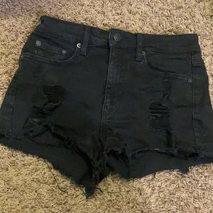 black ripped jean shorts